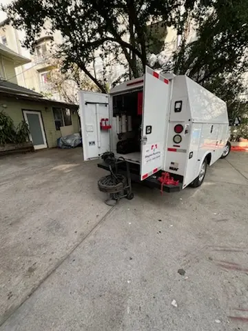 Magnet Plumbing service vehicle on-site for Grease Trap Cleaning in Wailua Homesteads